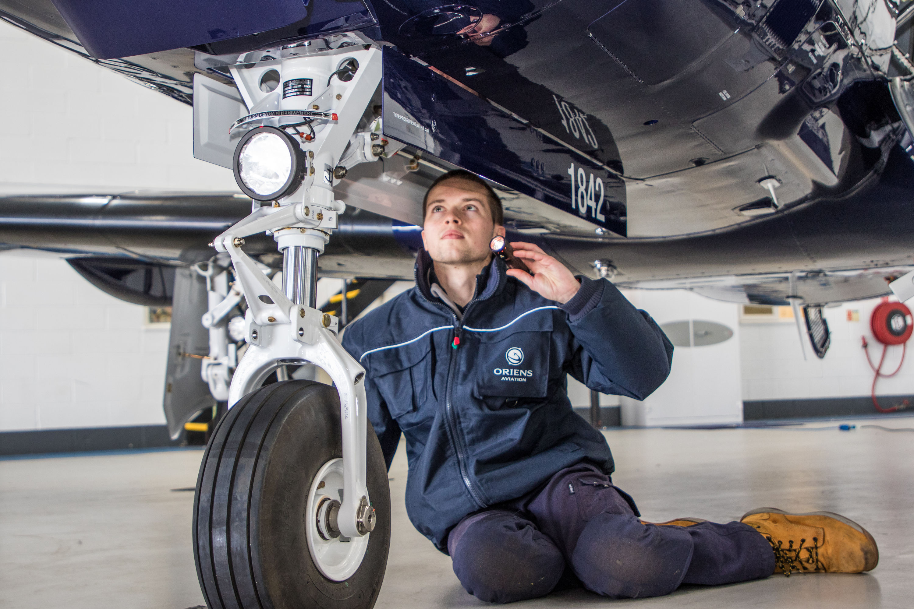 A_young_engineer_at_work_at_BBGA_member_company_Oriens_Aviation_Pilatus_Service_Centre_at_London_Biggin_Hill_Airport